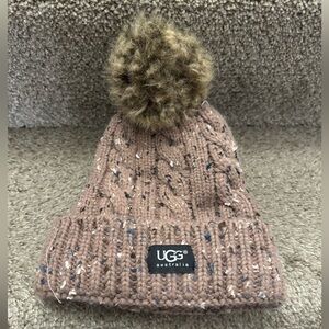 UGG Cable Beanie dusty pink color with faux-fur pom-pom